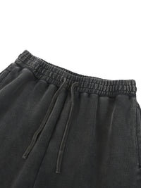Snow-washed REVIVE straight-leg sweatpants close-up of waist